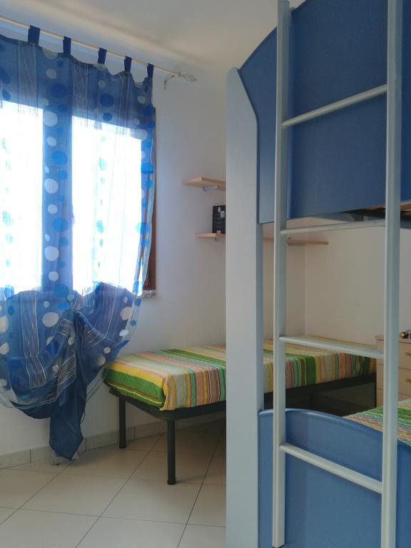 Casa Letizia Lejlighed Porto Pino Eksteriør billede